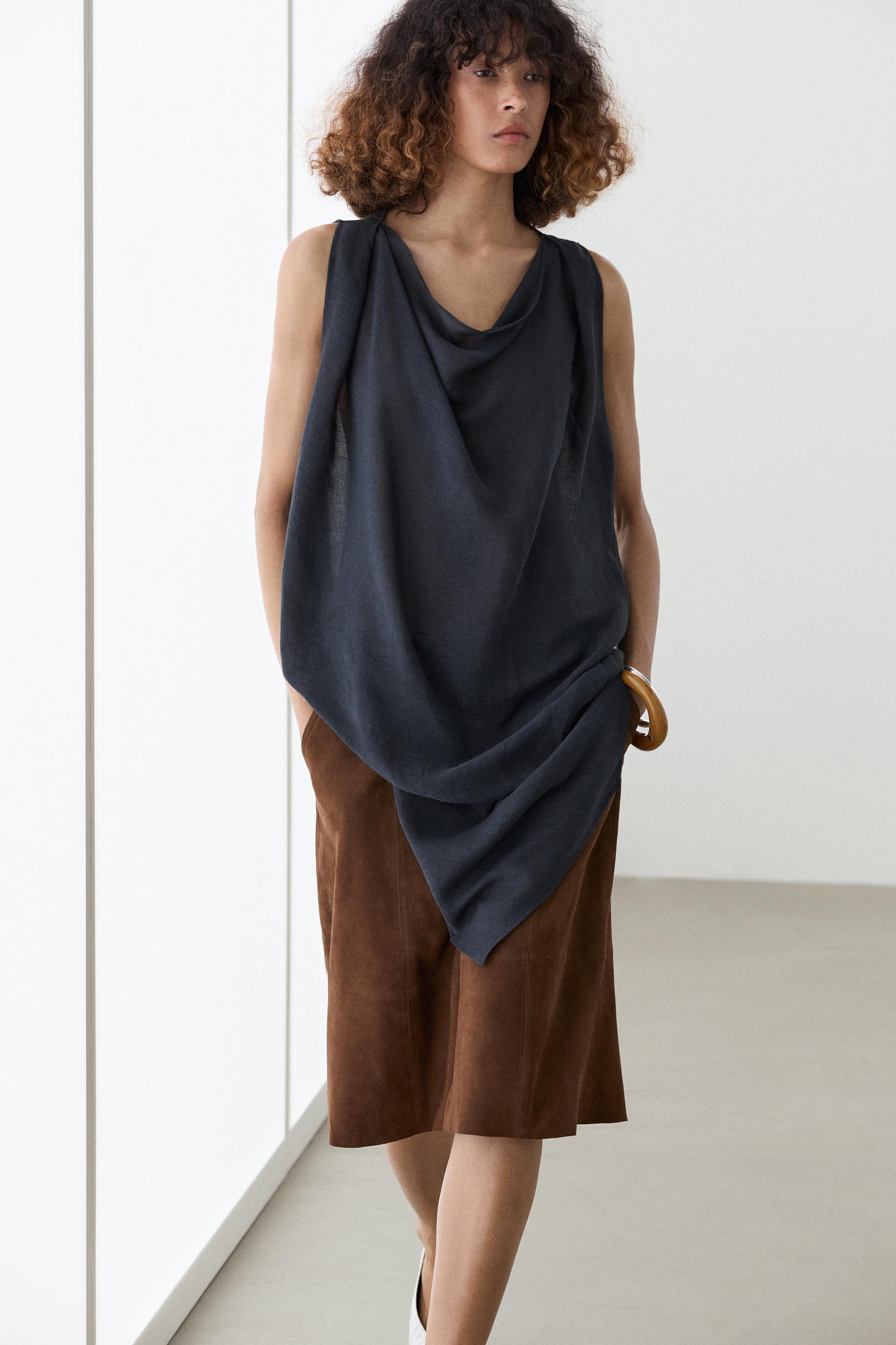 Asymmetric linen blend top